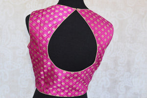Buy the Indian traditional pink sleeveless banarasi crop top blouse from our Pure Elegance store in Edison near NJ. Perfect for any engagement or wedding party. Back Slit.