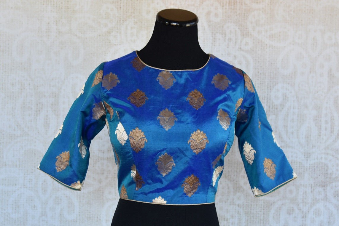 Shop this Indian traditional blue banarasi blouse from Pure Elegance online or from our store in Edison near NJ. It is ideal for any wedding or reception party. Front View.