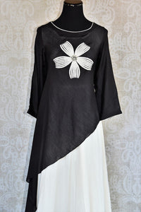 Buy the Black & white malmal cotton Indian outfit with a side tail cut online or from our Pure Elegance store in USA. It is perfect for any wedding or reception. Front View.