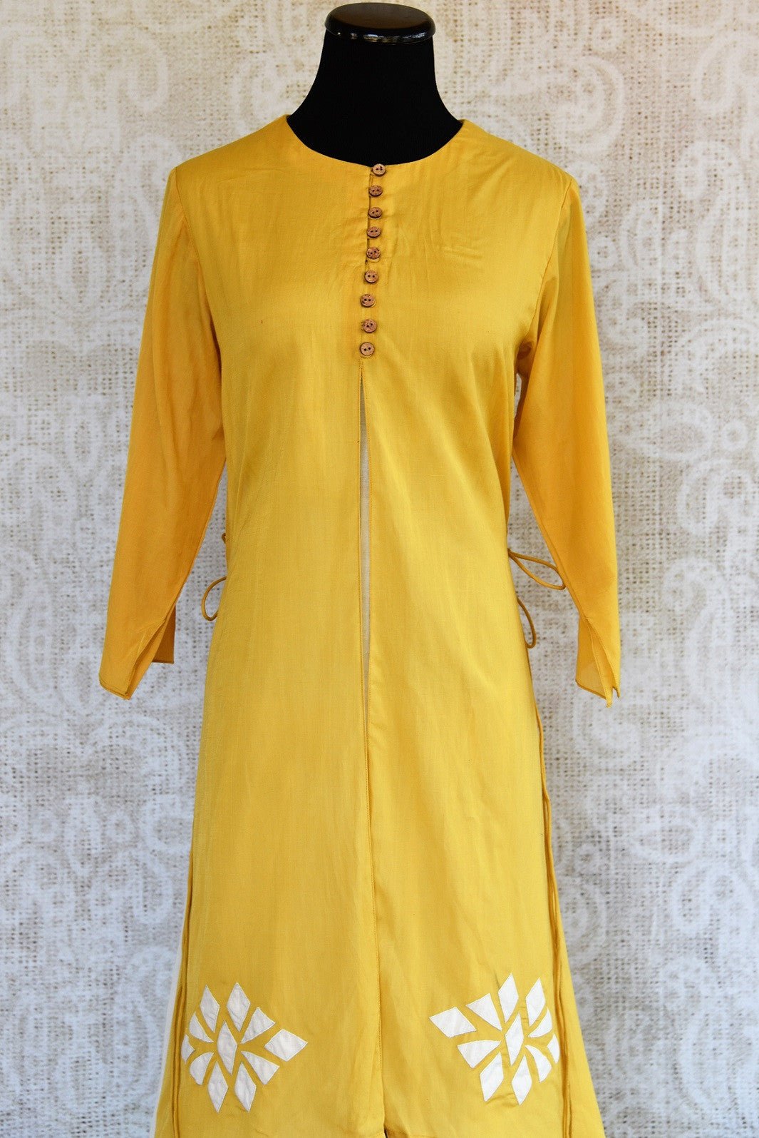 Buy this mustard Indo western yellow and white Indian ethnic dress online from our Pure Elegance store in USA. It is perfect for any wedding or reception party. Close up.