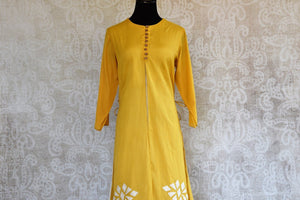 Buy this mustard Indo western yellow and white Indian ethnic dress online from our Pure Elegance store in USA. It is perfect for any wedding or reception party. Top View.