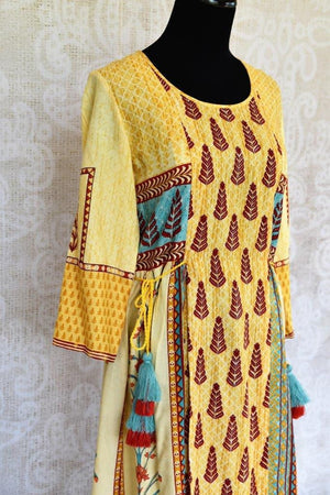 Buy this ethnic yellow cotton silk printed dress online or from our Pure Elegance store in Edison near NJ. We bring you stylish Indian dresses online in USA for every occasion.-top side view