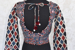 Shop this traditional Indian blue and red cotton designer blouse from Pure Elegance online or from our store in USA. Ideal for any wedding or reception party.  Back View.