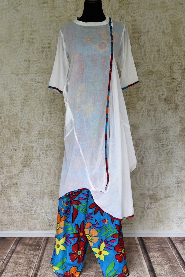 Shop summery white and blue printed cotton kurta set online in USA from Pure Elegance. Update your ethnic wardrobe with Indian designer suits available at our Indian fashion store in USA. -full view