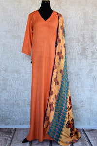 402023, Shop this Indian traditional orange cotton-silk dress from Pure Elegance with printed dupatta online or from our store in USA. Perfect for any wedding, reception or engagement. Front View.