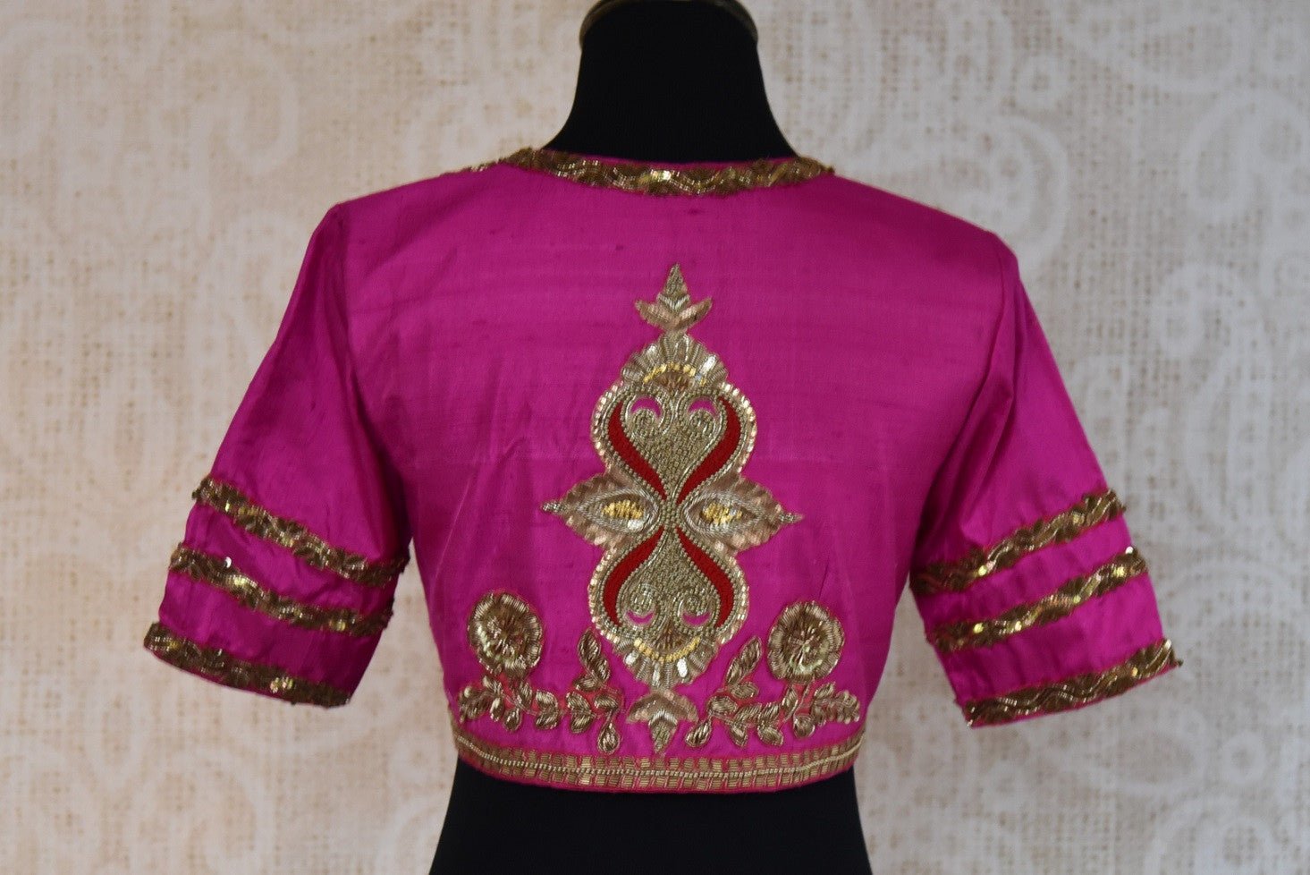 Buy this ethnic Indian round neck embroidered silk designer blouse from Pure Elegance online or from our store in Edison, near NJ. It is perfect for any wedding. Back View.