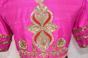 Buy this ethnic Indian round neck embroidered silk designer blouse from Pure Elegance online or from our store in Edison, near NJ. It is perfect for any wedding. Close up.