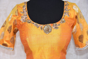 Shop this traditional Indian yellow silk designer blouse from Pure Elegance online or from our store in near NYC. It is perfect for any sangeet or prom party. Top View.
