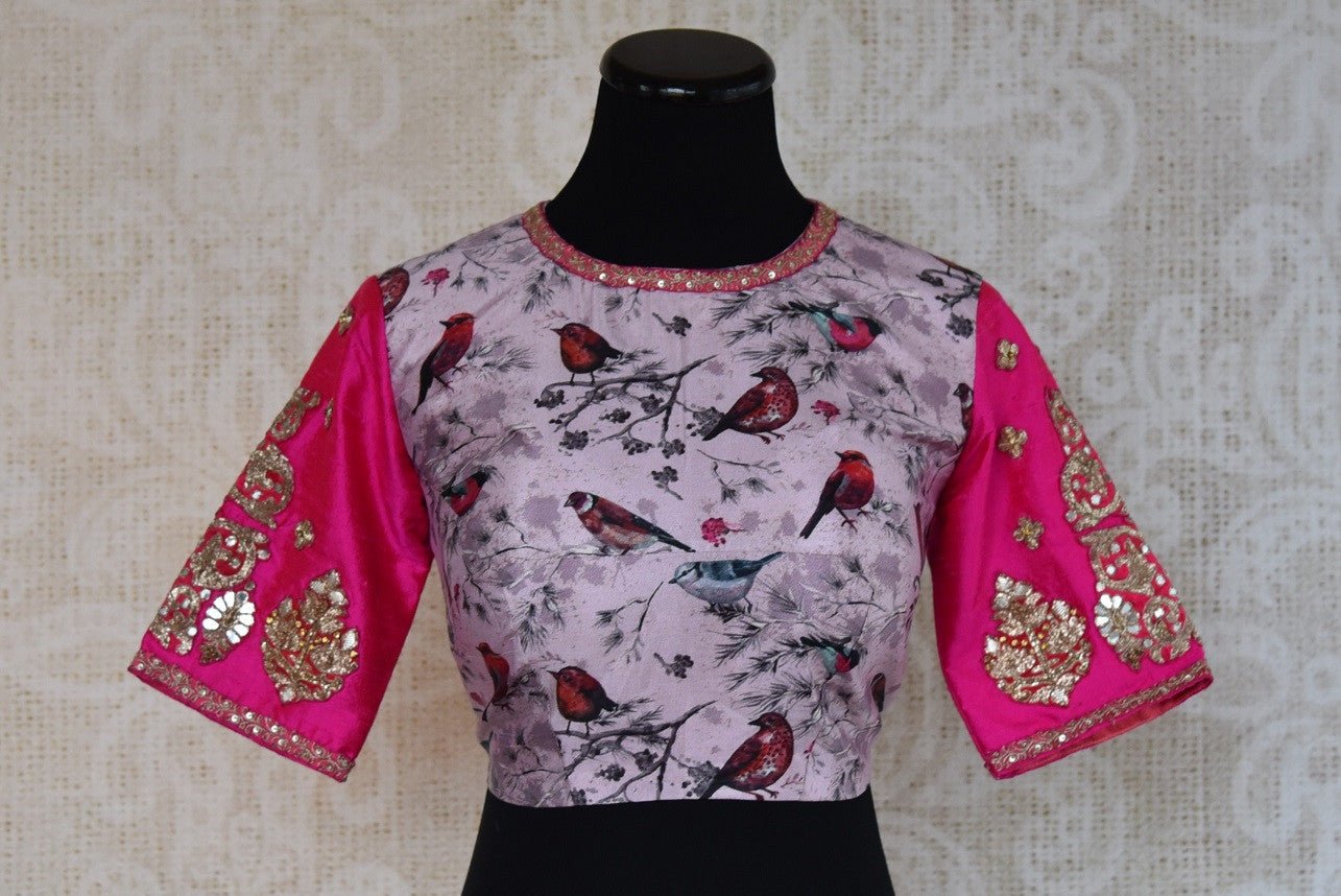 Buy this traditional Indian pink printed embroidered blouse from Pure Elegance online or from our store in USA. It is perfect for any sangeet party or wedding. Front View.