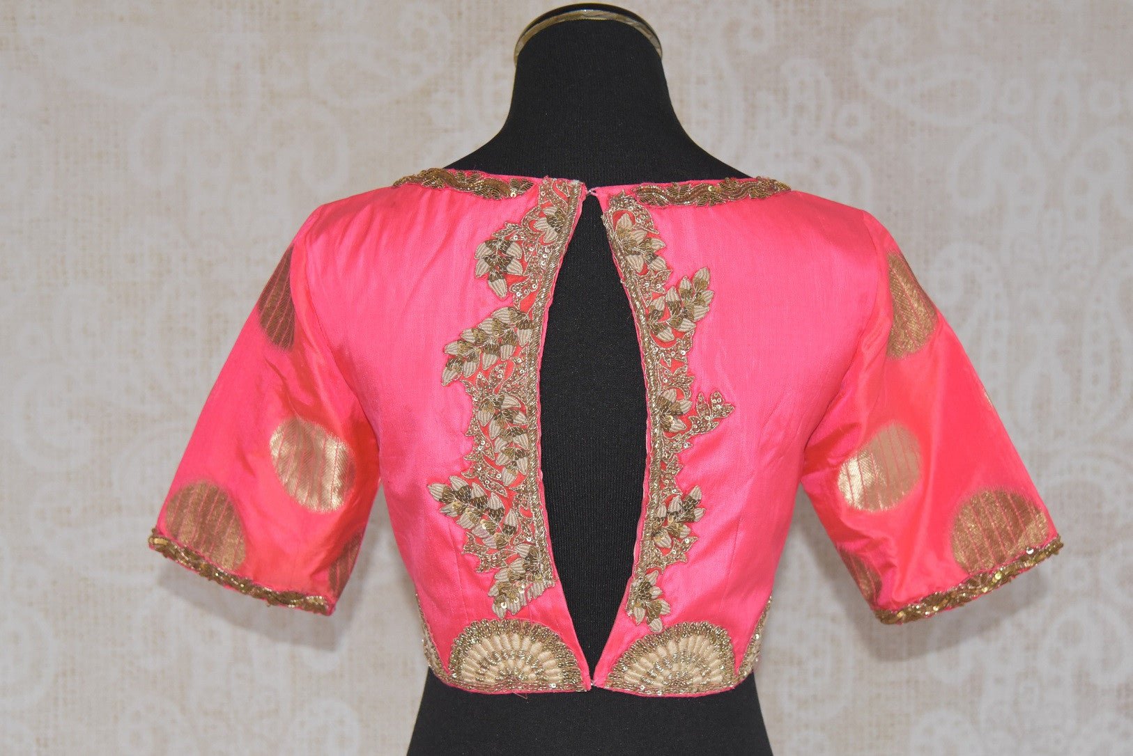 Buy this traditional silk designer blouse with embroidery and back cut out online or from our Pure Elegance store in Edison. Perfect for any wedding or reception. Back Slit.