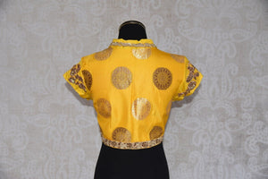 Buy this Indian traditional embroidered banarasi silk designer blouse from Pure Elegance is perfect for sangeet or puja. Buy it online or from our store in USA. Back View.