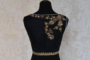 Shop this traditional banarasi silk black designer blouse from Pure Elegance store in USA or online . Embroidered fashion perfect for any sangeet or reception. Back View.