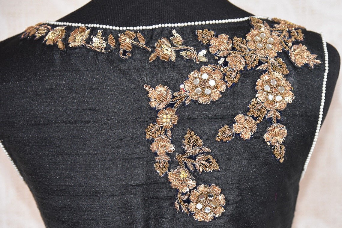 Shop this traditional banarasi silk black designer blouse from Pure Elegance store in USA or online . Embroidered fashion perfect for any sangeet or reception. Close up.