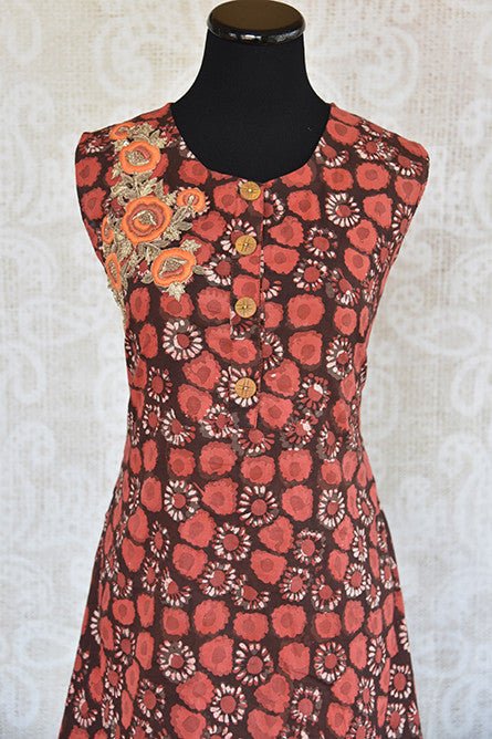 Printed and solid cotton dress available at our store Pure Elegance in USA. This casual pick is blend of Indian and western wear and ideal for birthday parties.-Printed top