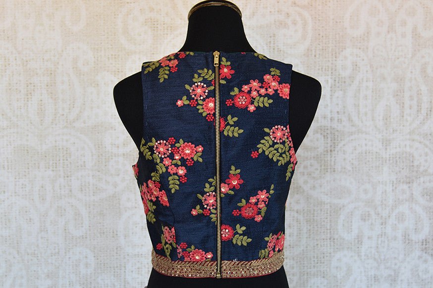Crop top style designer blouse in navy with floral work, zari lace on neck and hem can be bought from store and online. perfect for match with saree and skirts.-back