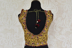 Yellow pre stitched ajrak printed cotton blouse. Perfect to match with cotton saree.-back