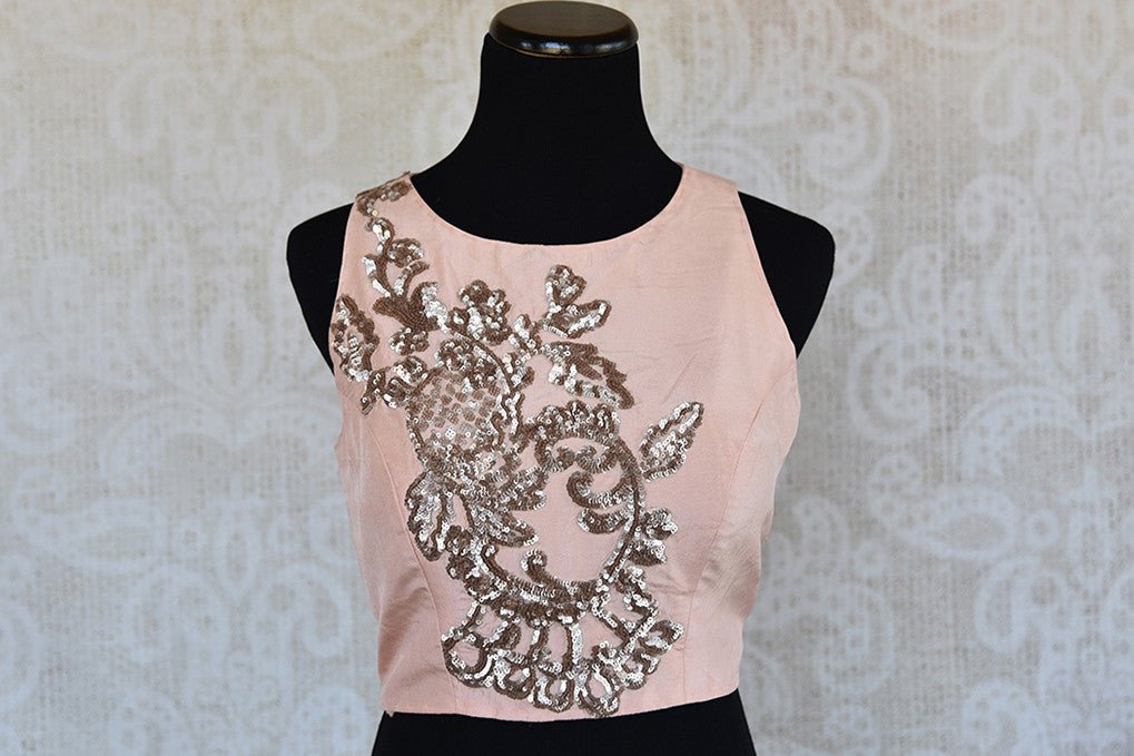 Pink with silver embroidery pre stitched silk blouse. Classy modern look blouse, perfect to match with saree. -front