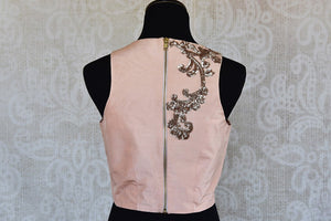 Pink with silver embroidery pre stitched silk blouse. Classy modern look blouse, perfect to match with saree. -back