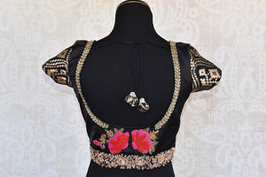 Classy black designer silk blouse with thread embroidery in front and back. Ethnic look deep neck blouse.-back