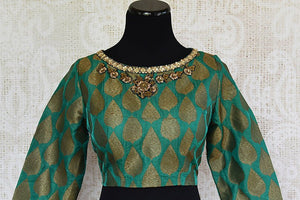 Green pre stitched embroidered banarasi silk blouse. Pair this with any silk saree or skirt.-full view