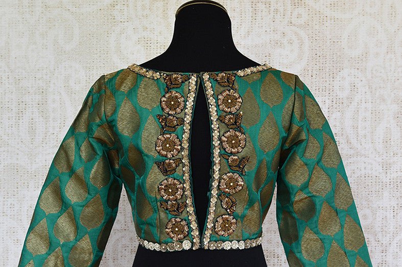 Green pre stitched embroidered banarasi silk blouse. Pair this with any silk saree or skirt.-back