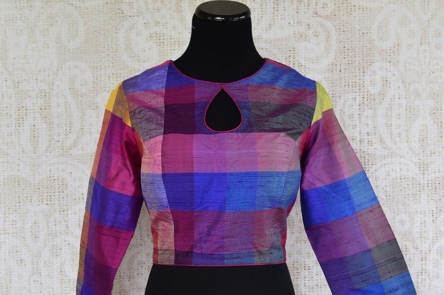 Purple checker ikkat silk blouse. This Blouse has front keyhole design and perfect to pair with solid saree.-front