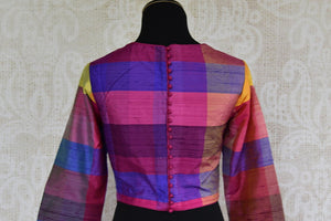 Purple checker ikkat silk blouse. This Blouse has front keyhole design and perfect to pair with solid saree-back design