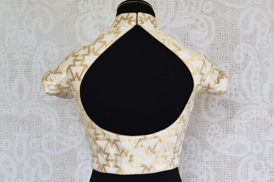 White and gold banarasi silk blouse. Pair this modern blouse with any lahenga, saree.-back