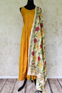 Shop golden silk Anarkali dress online in USA with kantha work dupatta from Pure Elegance Indian fashion store in USA. Make a stylish fashion statement this summer with a range of exquisite Indian dresses available online and at our clothing store in USA. Shop now.-full view