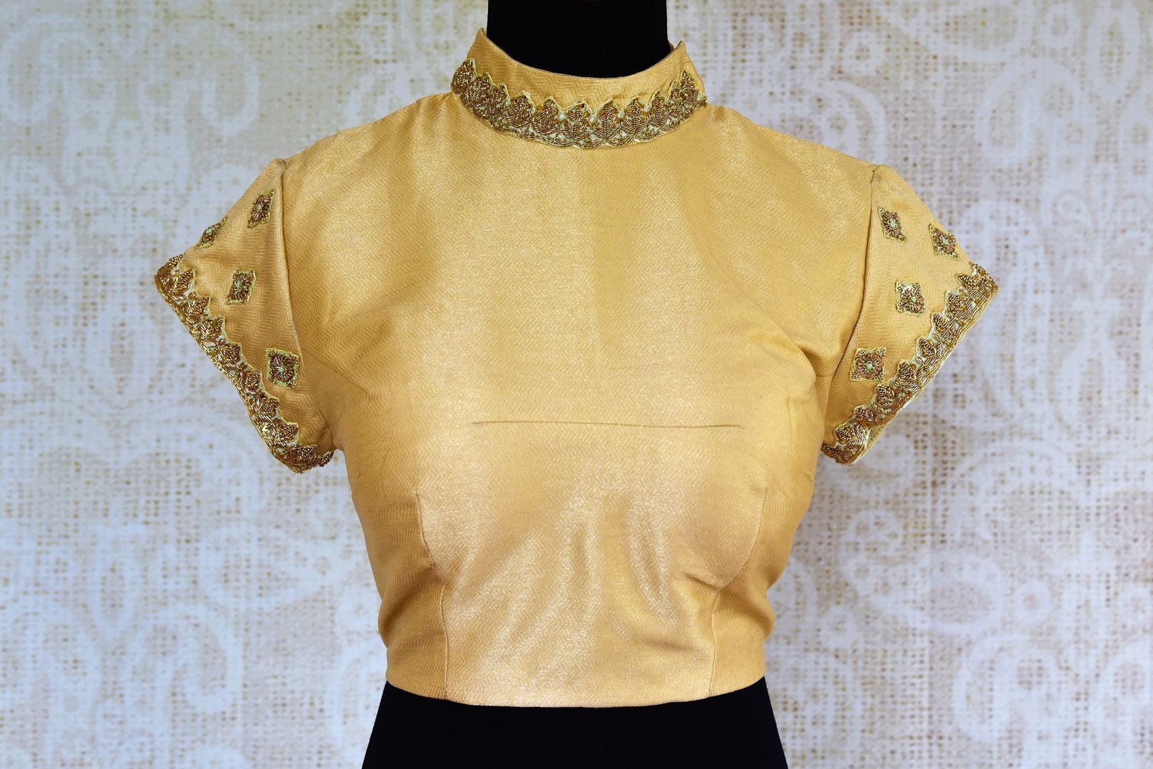 Buy cream silk embroidered blouse online in USA from Pure Elegance. Our Indian fashion store in USA brings stylish range of designer Indian blouses for women.-front