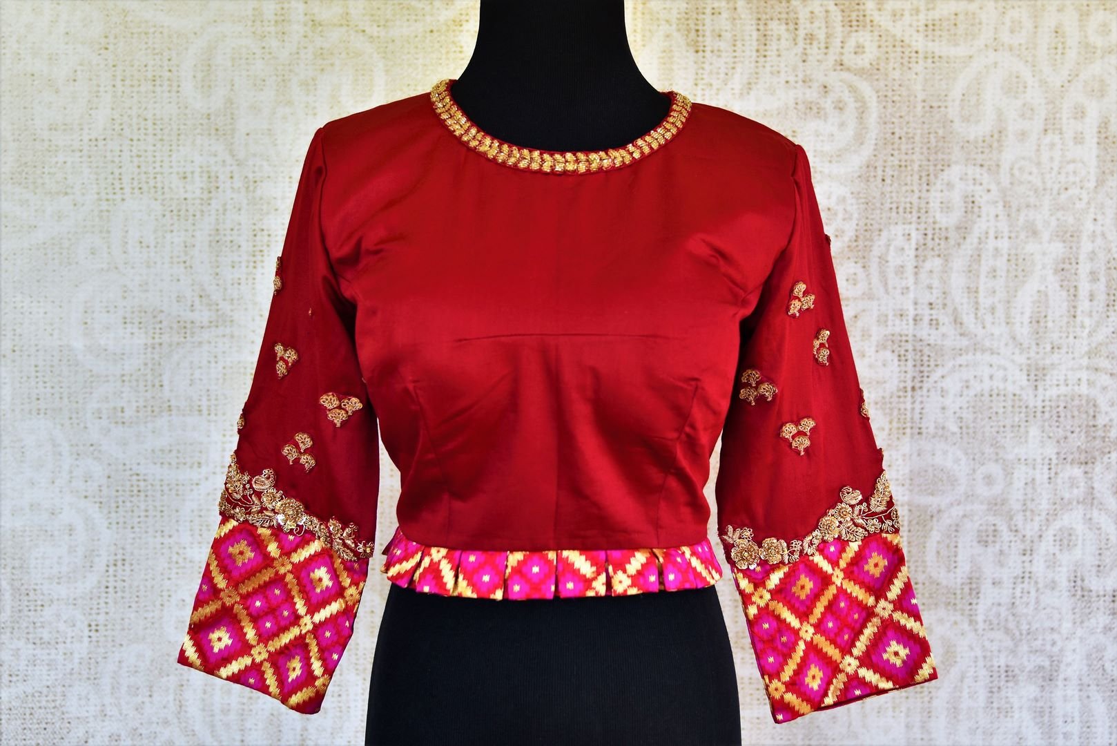 Buy beautiful red embroidered silk blouse online from Pure Elegance. Our Indian fashion store in USA brings a stunning range of readymade saree blouses for women.-front