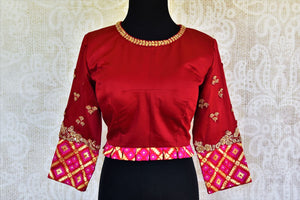 Buy beautiful red embroidered silk blouse online from Pure Elegance. Our Indian fashion store in USA brings a stunning range of readymade saree blouses for women.-front