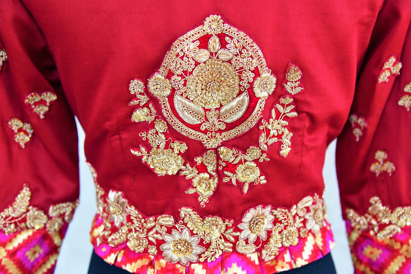 Buy beautiful red embroidered silk blouse online from Pure Elegance. Our Indian fashion store in USA brings a stunning range of readymade saree blouses for women.-details