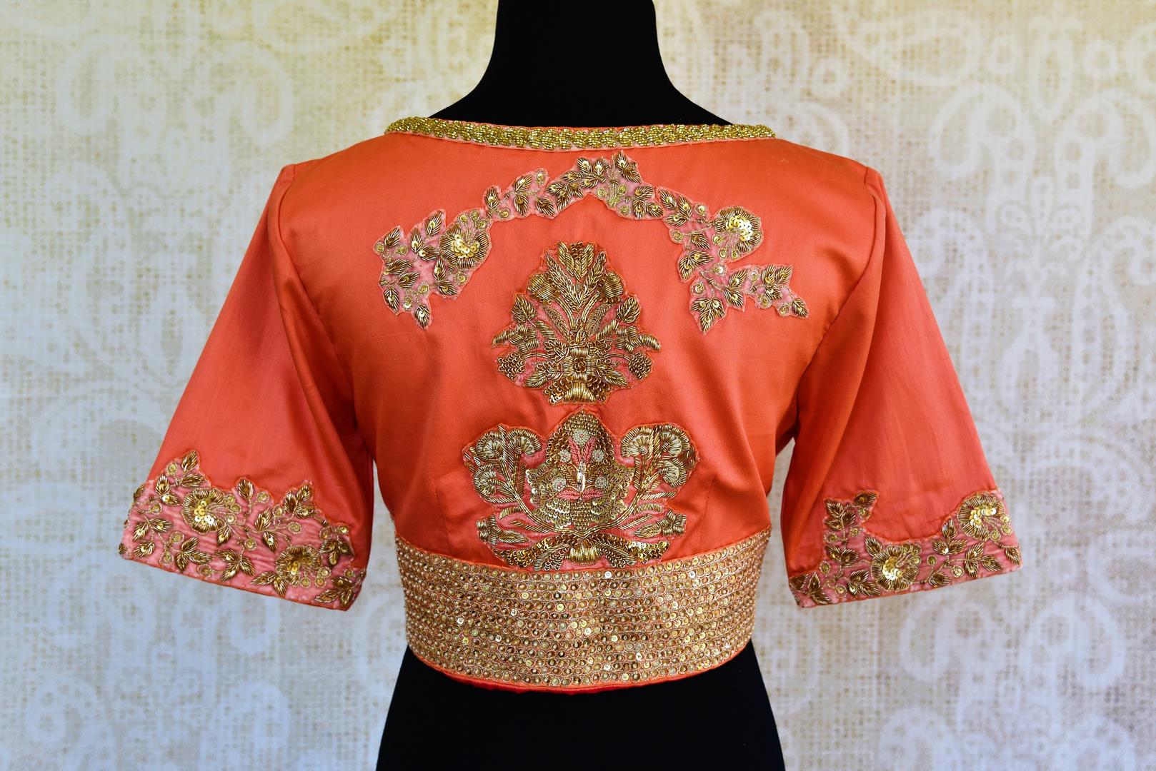 Buy stylish peach embroidered silk blouse online in USA. Pure Elegance fashion store presents a stunning range of readymade Indian saree blouses in USA for women.-back