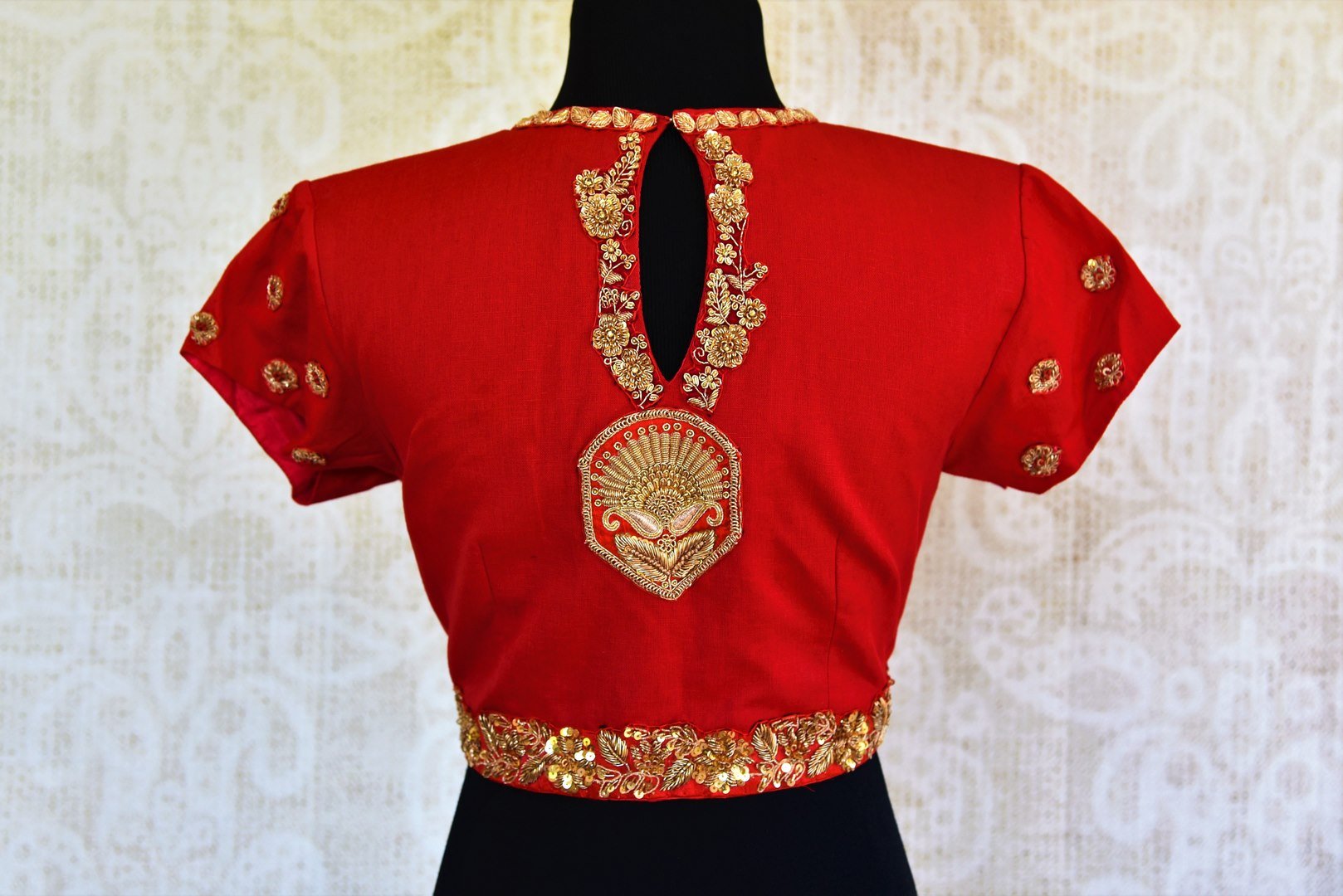 Buy bright red embroidered silk blouse online in USA with high neckline. Pure Elegance fashion store presents a range of ready-made designer blouses for saree in USA.-back