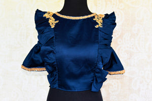 Buy blue embroidered silk blouse online in USA with cold shoulder sleeves. Pure Elegance fashion store brings a range of ready-made Indian saree blouses in USA.-front
