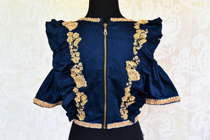 Buy blue embroidered silk blouse online in USA with cold shoulder sleeves. Pure Elegance fashion store brings a range of ready-made Indian saree blouses in USA.-back
