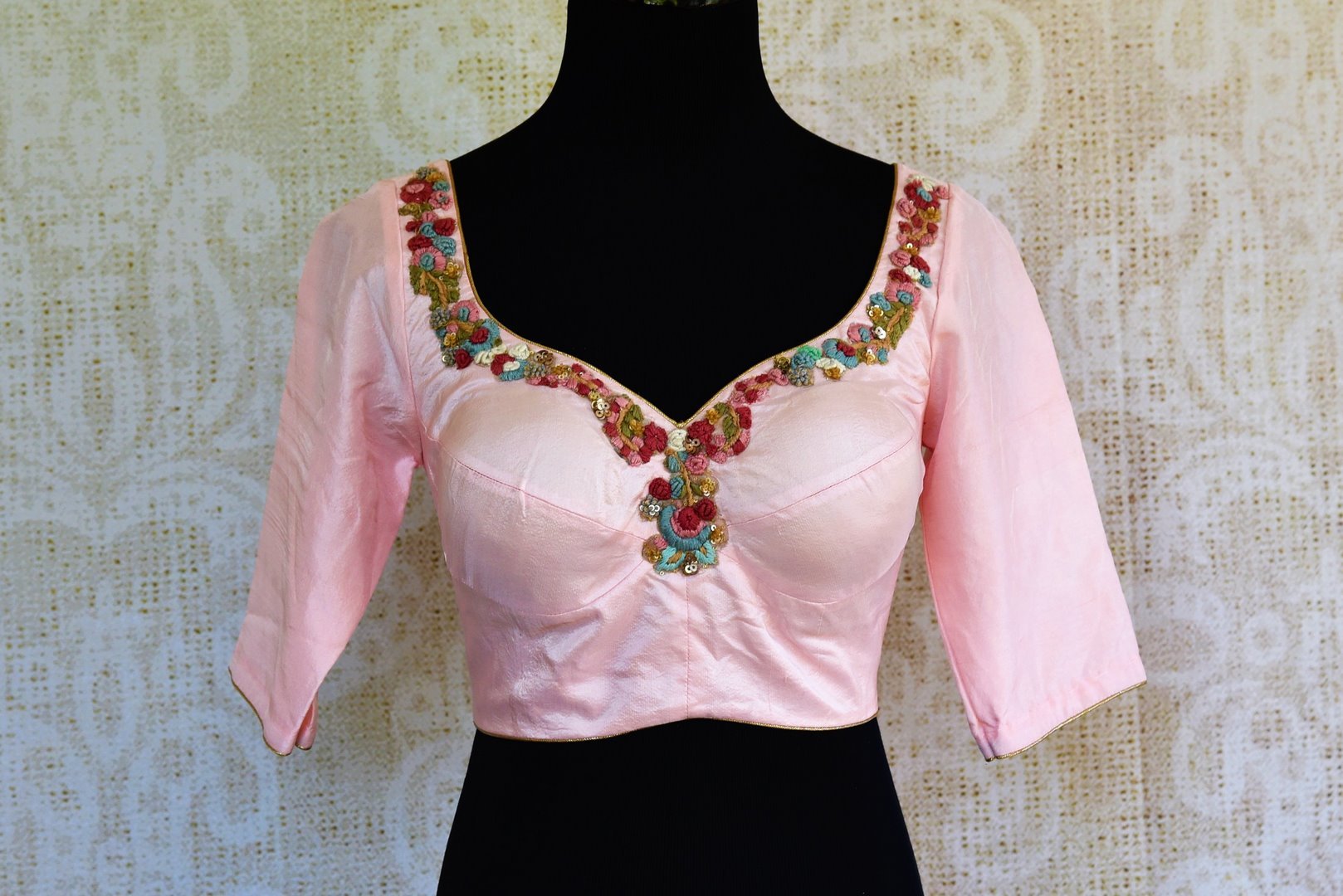 Buy baby pink embroidered silk blouse online in USA. Pure Elegance fashion store brings an exquisite range of Indian readymade saree blouses in USA for women.-front