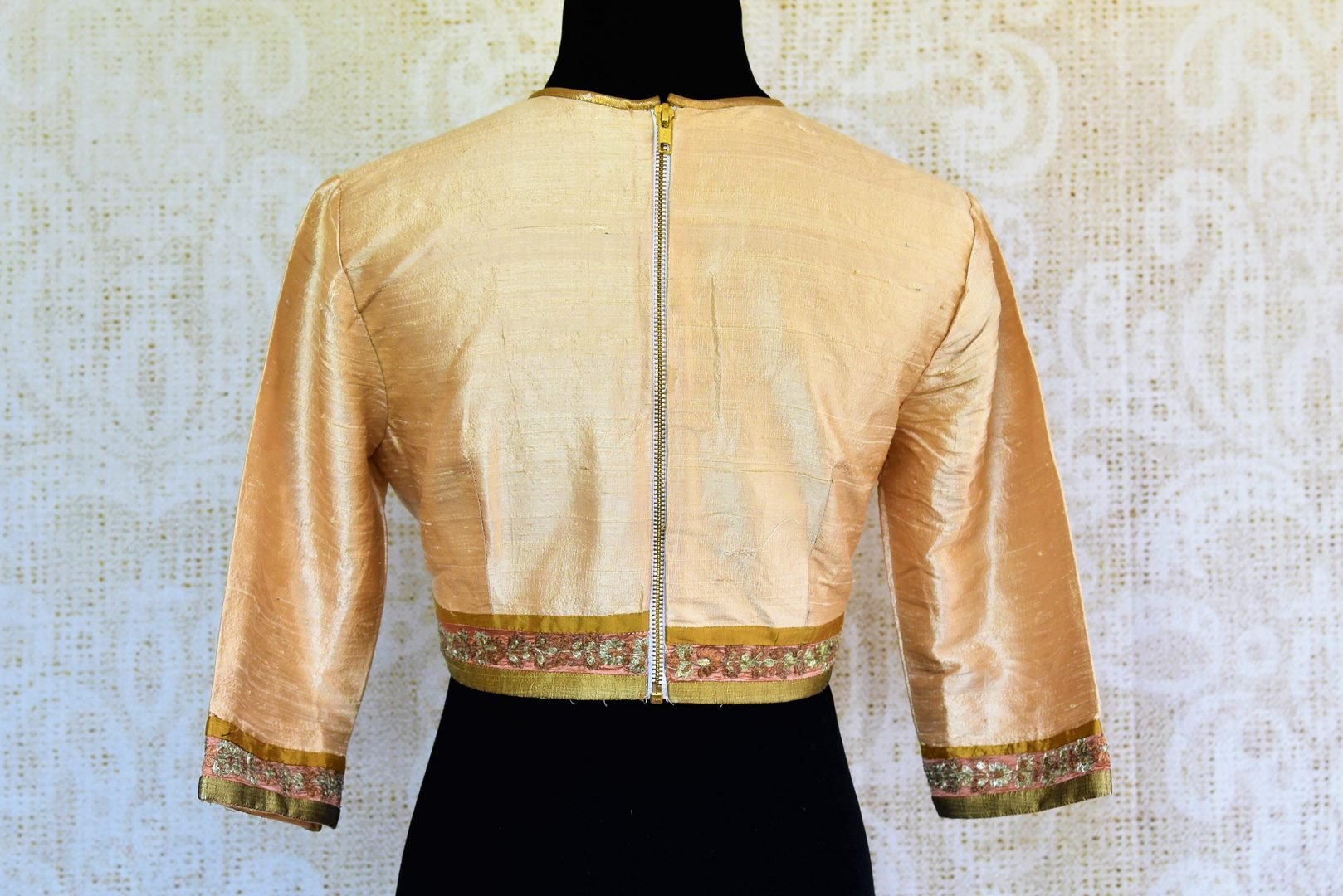 Buy gold raw silk embroidered saree blouse online in USA. Pure Elegance fashion store brings an alluring range of Indian readymade sari blouses in USA for women.-back
