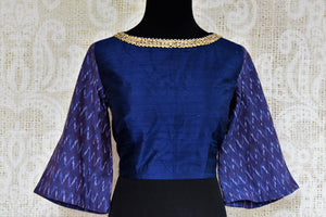 Dark blue raw silk embroidered saree blouse for online shopping in USA. Pure Elegance clothing store brings an exquisite range of Indian sari blouses in USA for women.-front