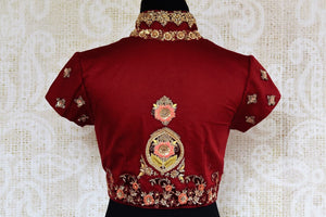 Buy maroon embroidered silk saree blouse online in USA. Pure Elegance clothing store brings an exquisite range of Indian designer saree blouses in USA for women. -back