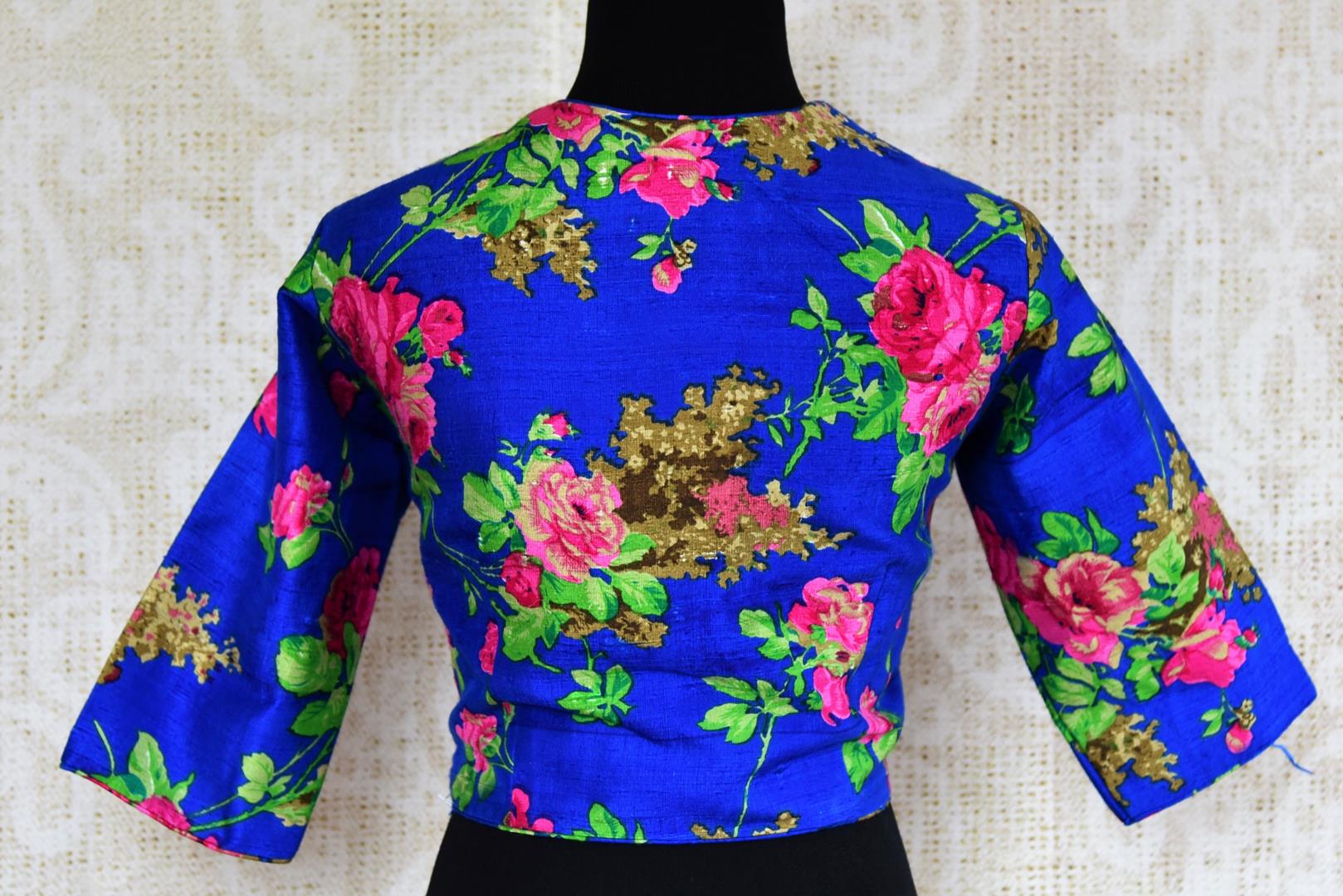 Buy blue floral print raw silk saree blouse online in USA. Pure Elegance clothing store brings an exquisite range of Indian designer sari blouses in USA for women.  -back