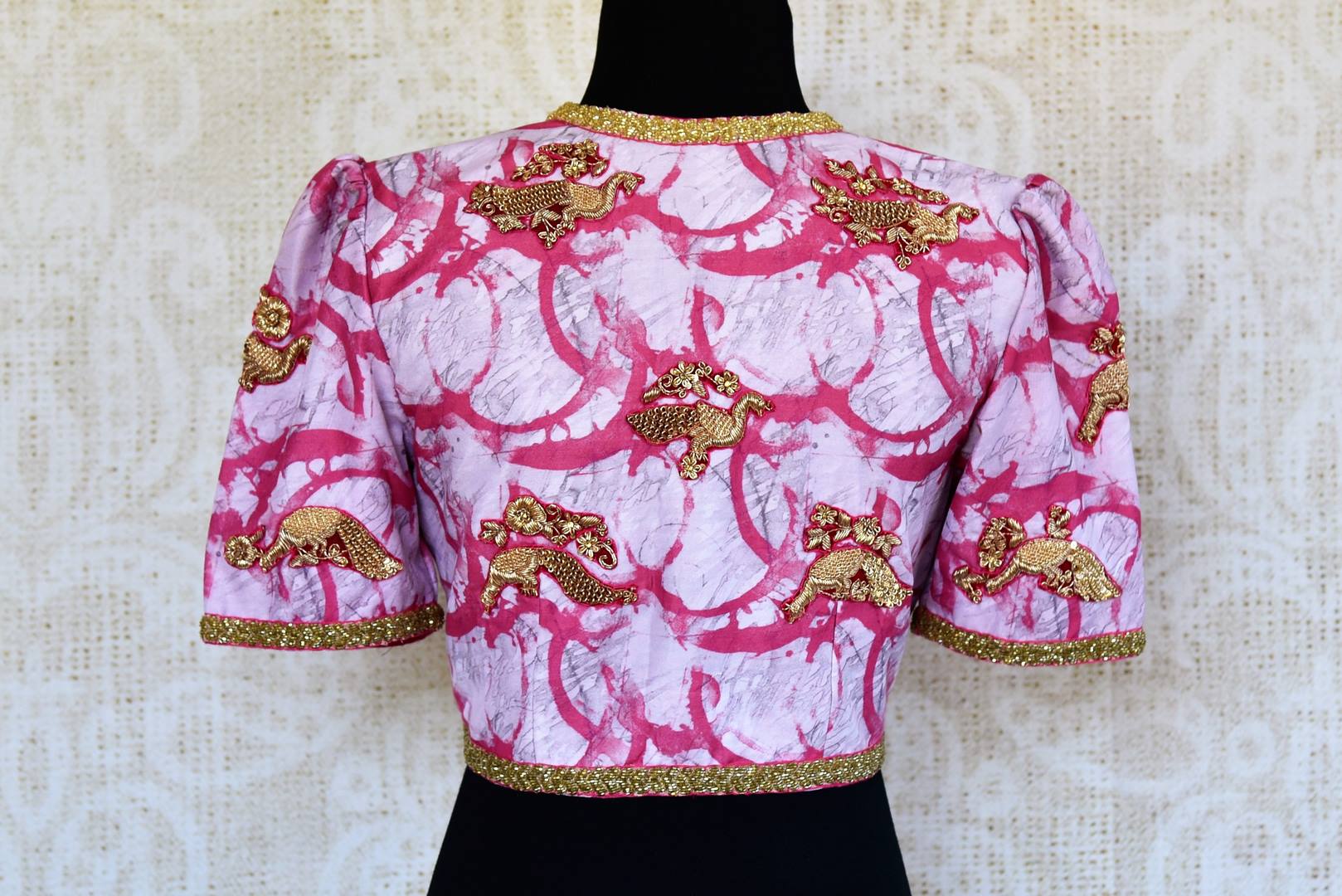 Buy white and pink printed silk embroidered readymade saree blouse online in USA. Pure Elegance clothing store brings an alluring range of Indian sari blouses in USA.-back