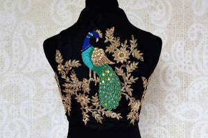 Buy black embroidered raw silk sari blouse online in USA. Pure Elegance clothing store brings an exquisite range of Indian readymade saree blouses in USA for women.  -back