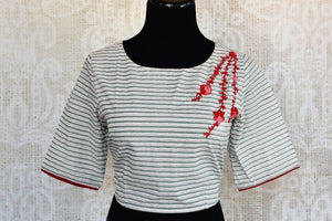 Buy red and white embroidered crop top with printed skirt online in USA Keep your style quotient up with Indian designer dresses at Pure Elegance online store in USA. -top