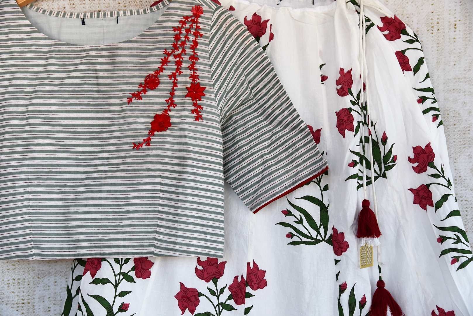 Buy red and white embroidered crop top with printed skirt online in USA Keep your style quotient up with Indian designer dresses at Pure Elegance online store in USA. -closeup