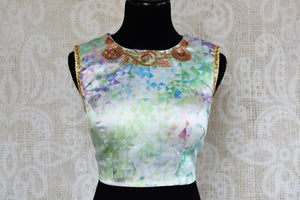 Buy green silk embroidered saree blouse online in USA.  Elevate your Indian saree look with beautiful readymade saree blouses at Pure Elegance Clothing Store in USA.-front