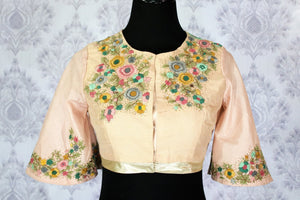 Buy peach saree blouse with embroidery online in USA. Pure Elegance Indian clothing store brings an exquisite range of designer blouses in USA to match your gorgeous Indian sarees. Add spark to your ethnic look with stylish saree blouses for every occasion.-front