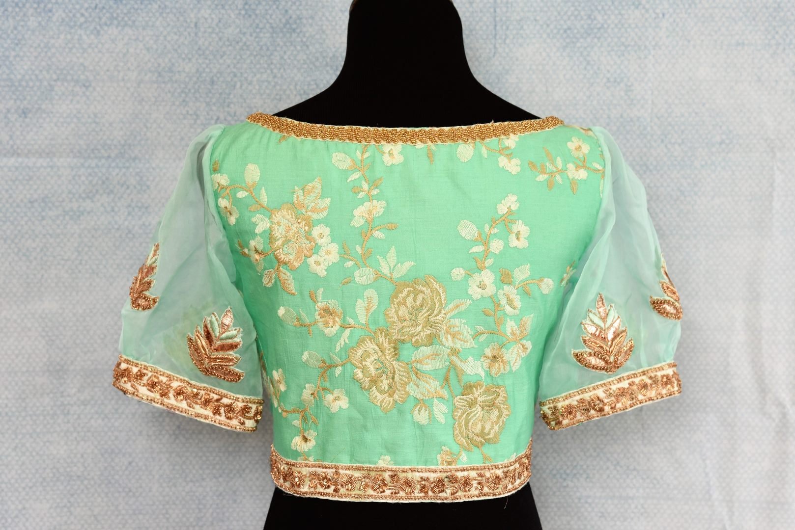 Buy pastel green thread embroidery readymade silk saree blouse online in USA. The blouse is a perfect match to add brightness to your Indian sarees. Shop beautiful Indian designer sari blouse in USA from Pure Elegance exclusive Indian clothing store in USA or shop online.-back