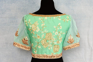 Buy pastel green thread embroidery readymade silk saree blouse online in USA. The blouse is a perfect match to add brightness to your Indian sarees. Shop beautiful Indian designer sari blouse in USA from Pure Elegance exclusive Indian clothing store in USA or shop online.-back